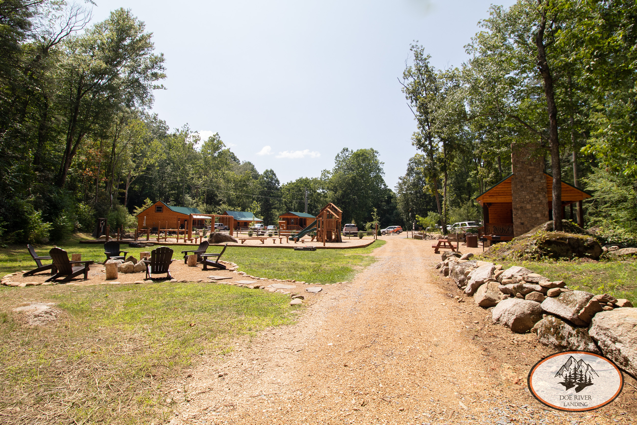 Doe River Landing campground and event venue in Roan Mountain, TN. Best vacation rental and event space near Elizabethton, TN and Johnson City TN. The campground features a playground, community fire pit, Toy Barn, bathhouse, games, activities, and more.